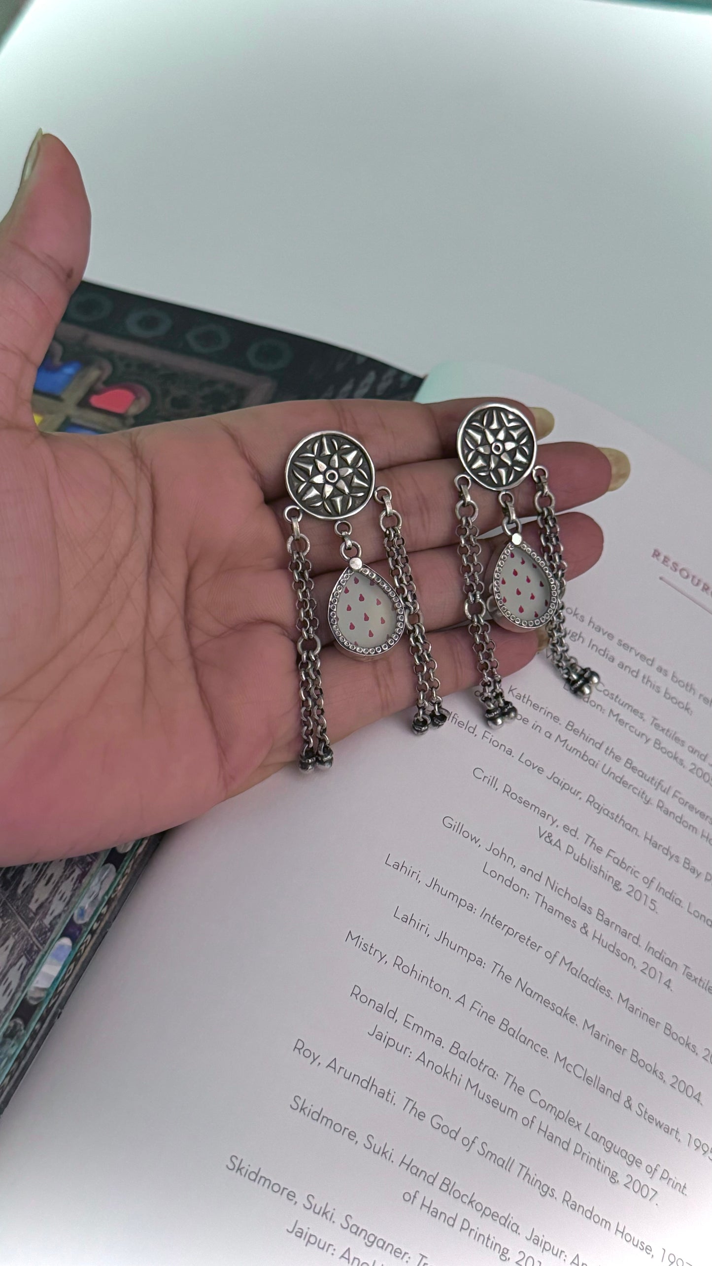 HawaMahal  : Embrace elegance with our silver earrings, reflecting the charm of a royal heritage!