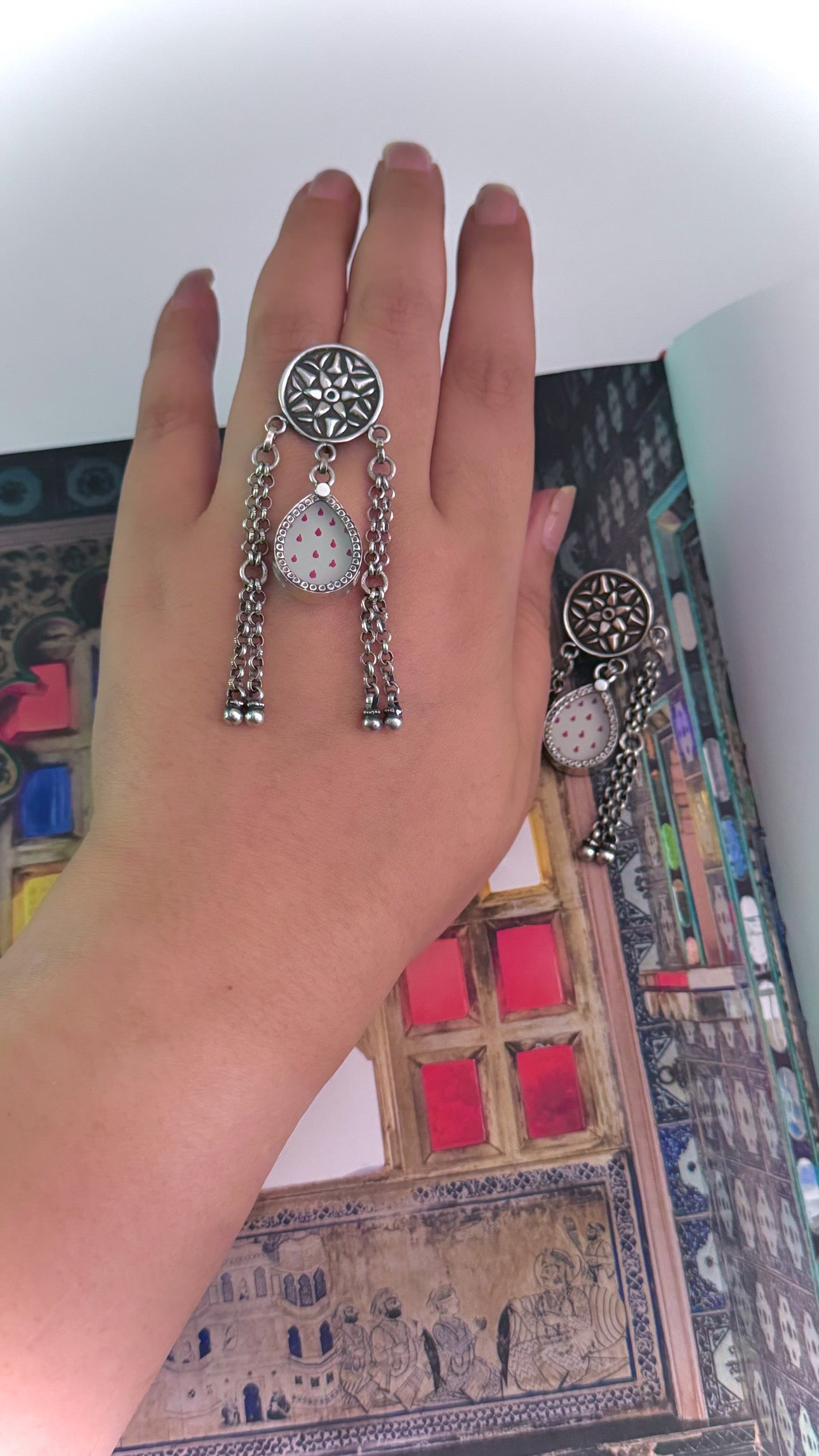HawaMahal  : Embrace elegance with our silver earrings, reflecting the charm of a royal heritage!